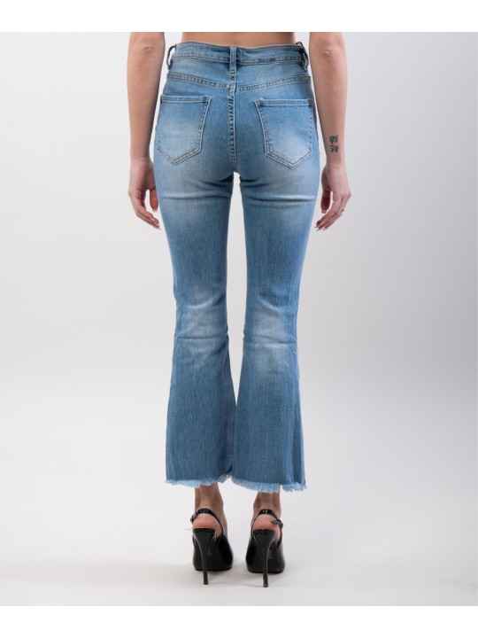 Jeans a zampa con frange