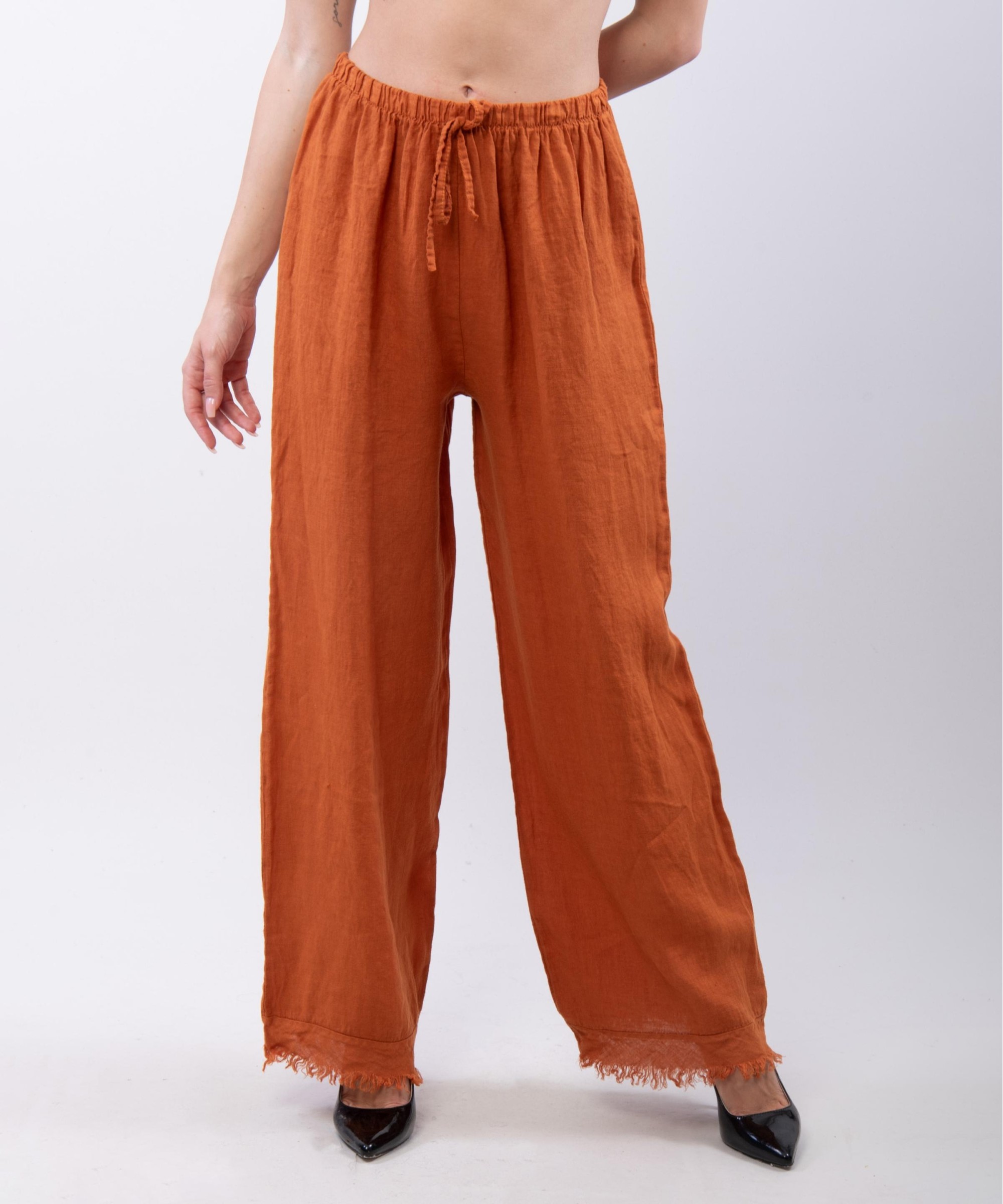 Pantalone palazzo con frange sotto in lino