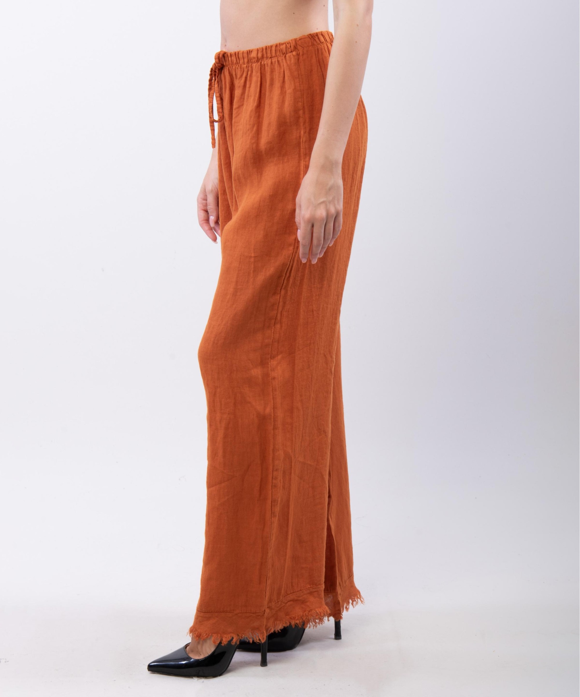 Pantalone palazzo con frange sotto in lino
