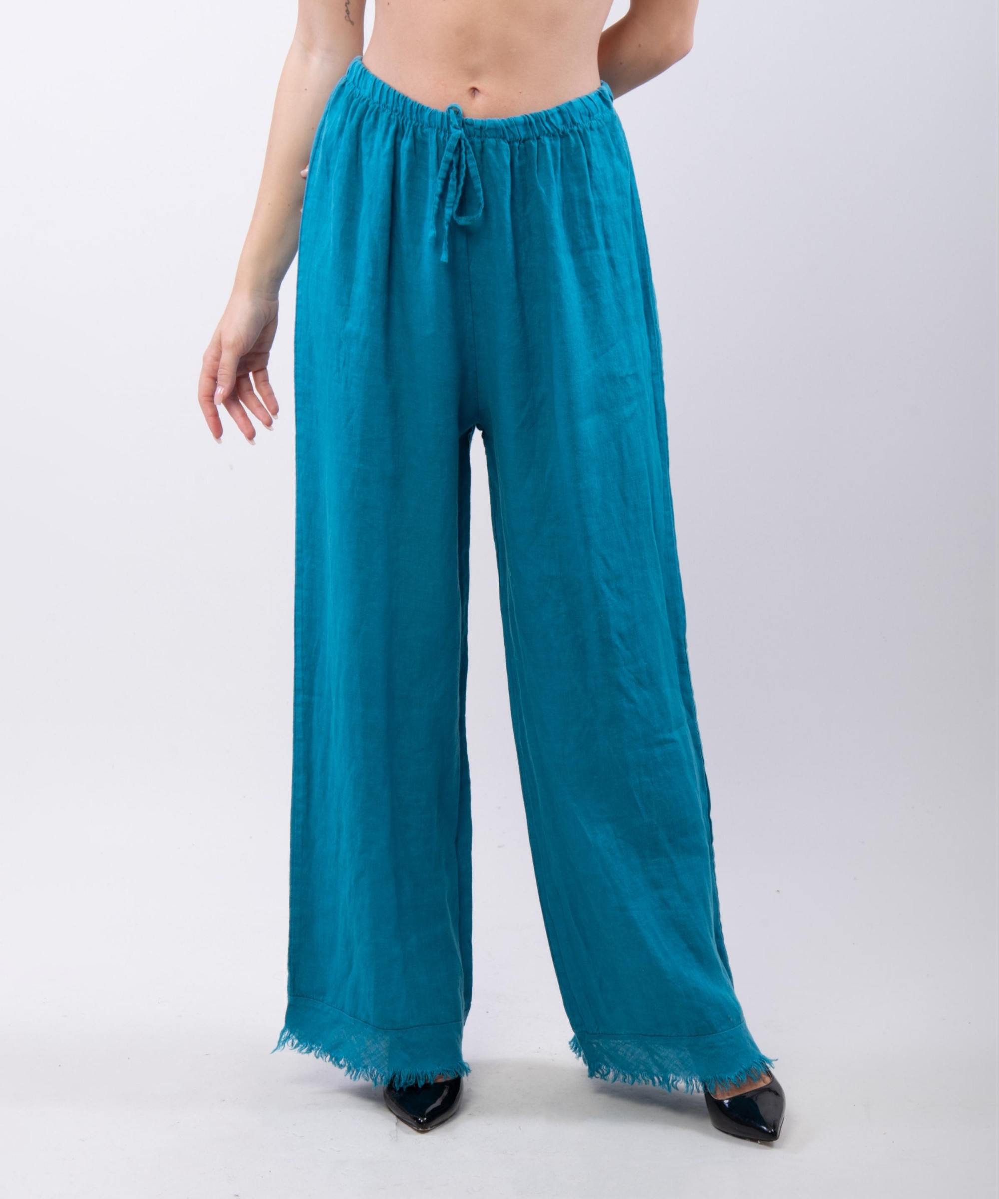 Pantalone palazzo con frange sotto in lino