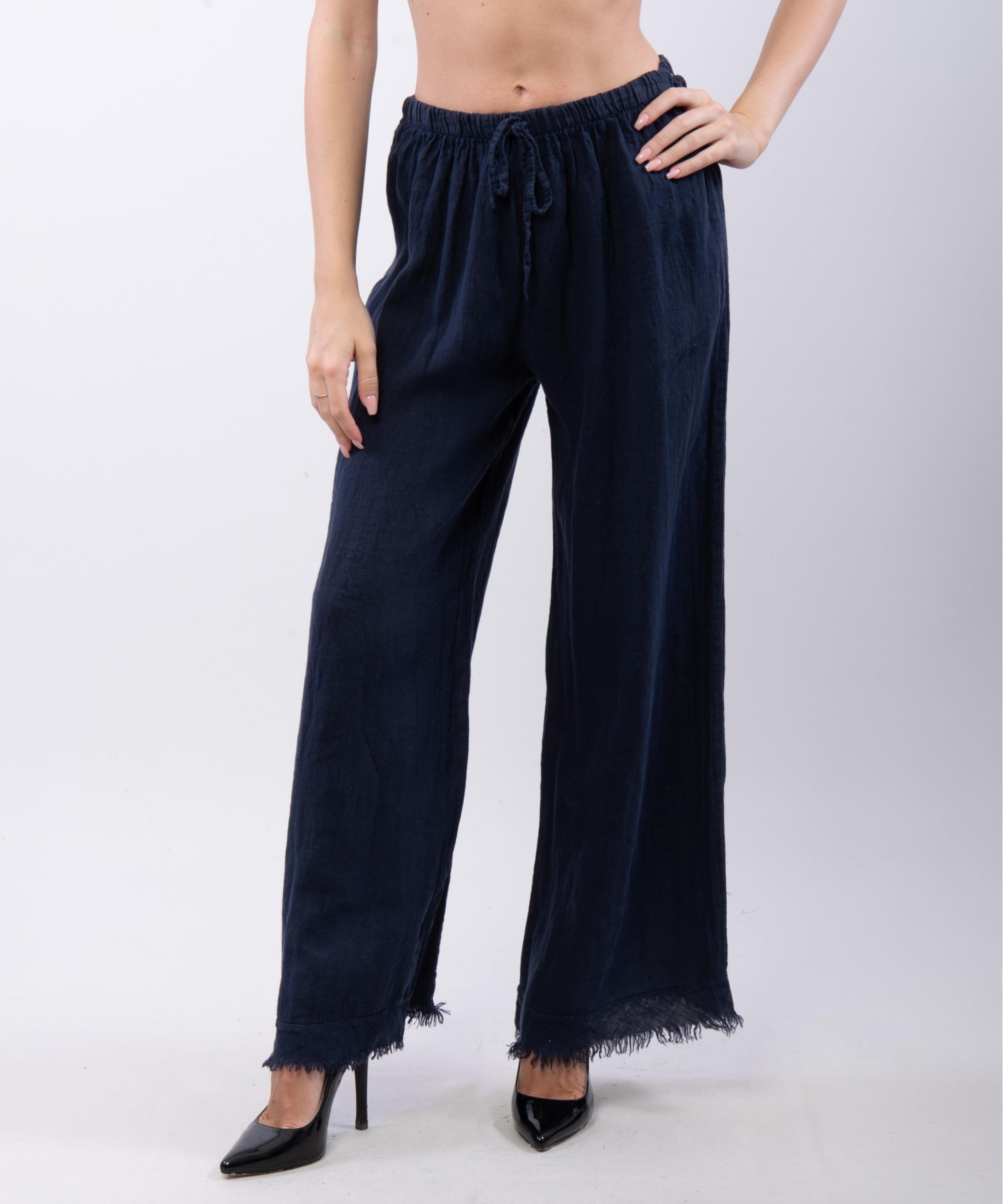 Pantalone palazzo con frange sotto in lino