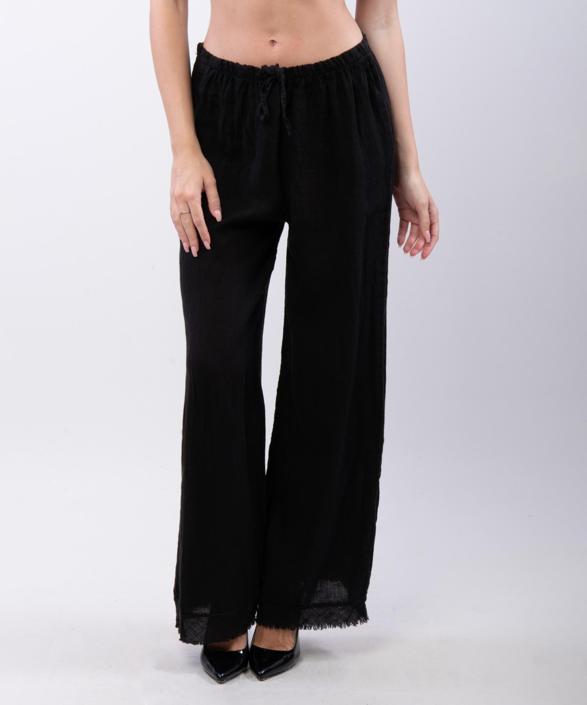 Pantalone palazzo con frange sotto in lino