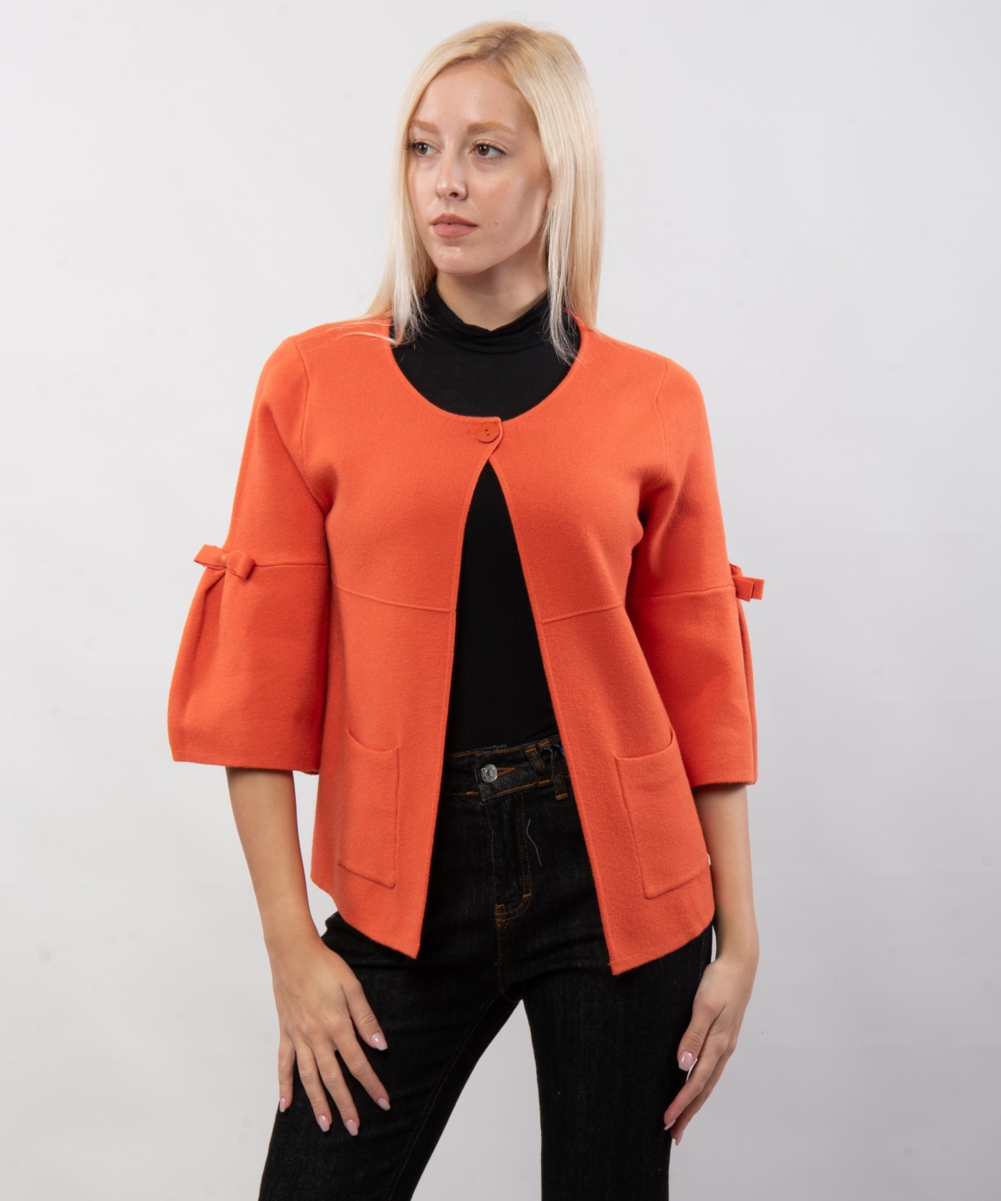 coprispalle maglieria con fiocco alle maniche