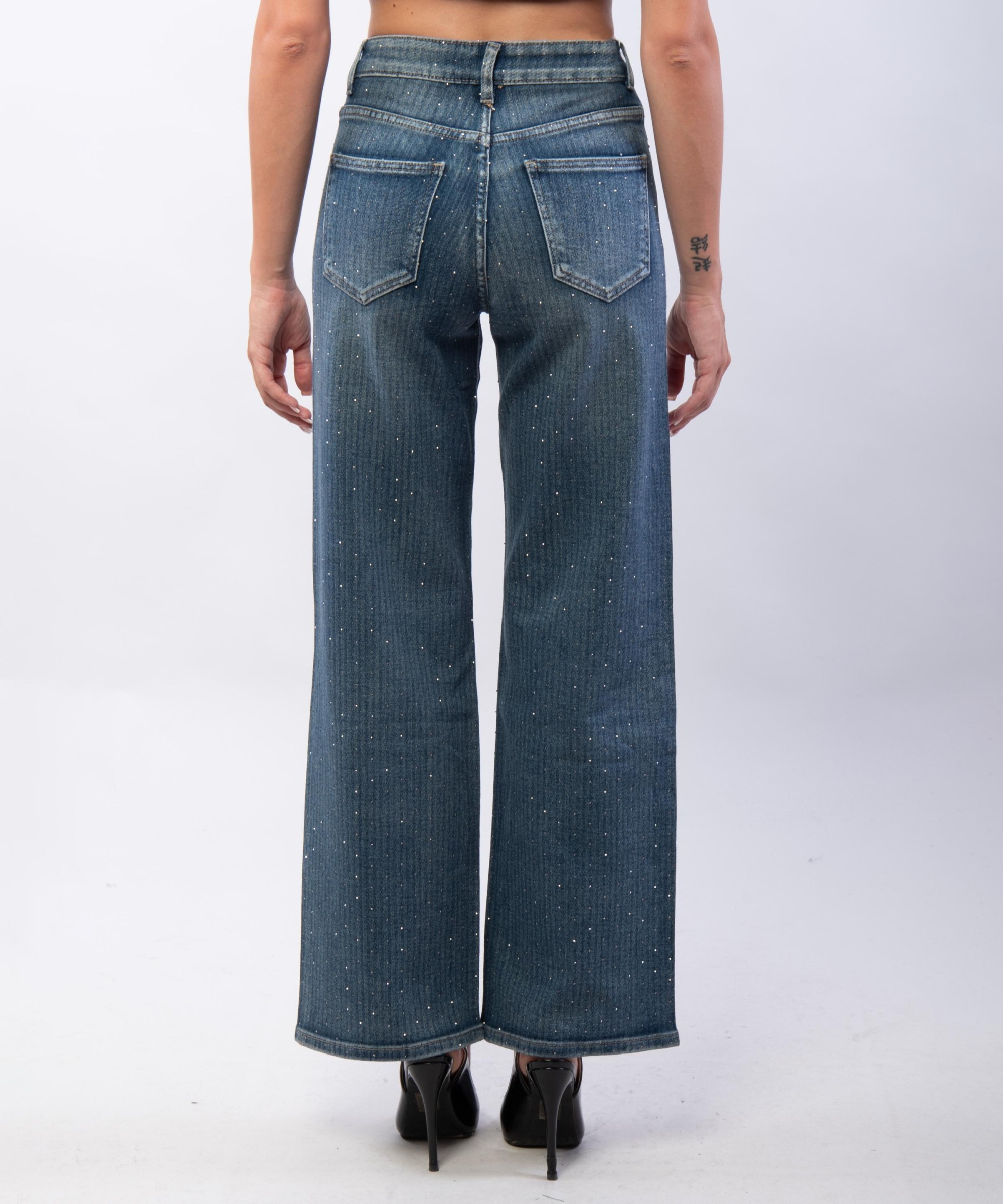 jeans a palazzo a righe con strass