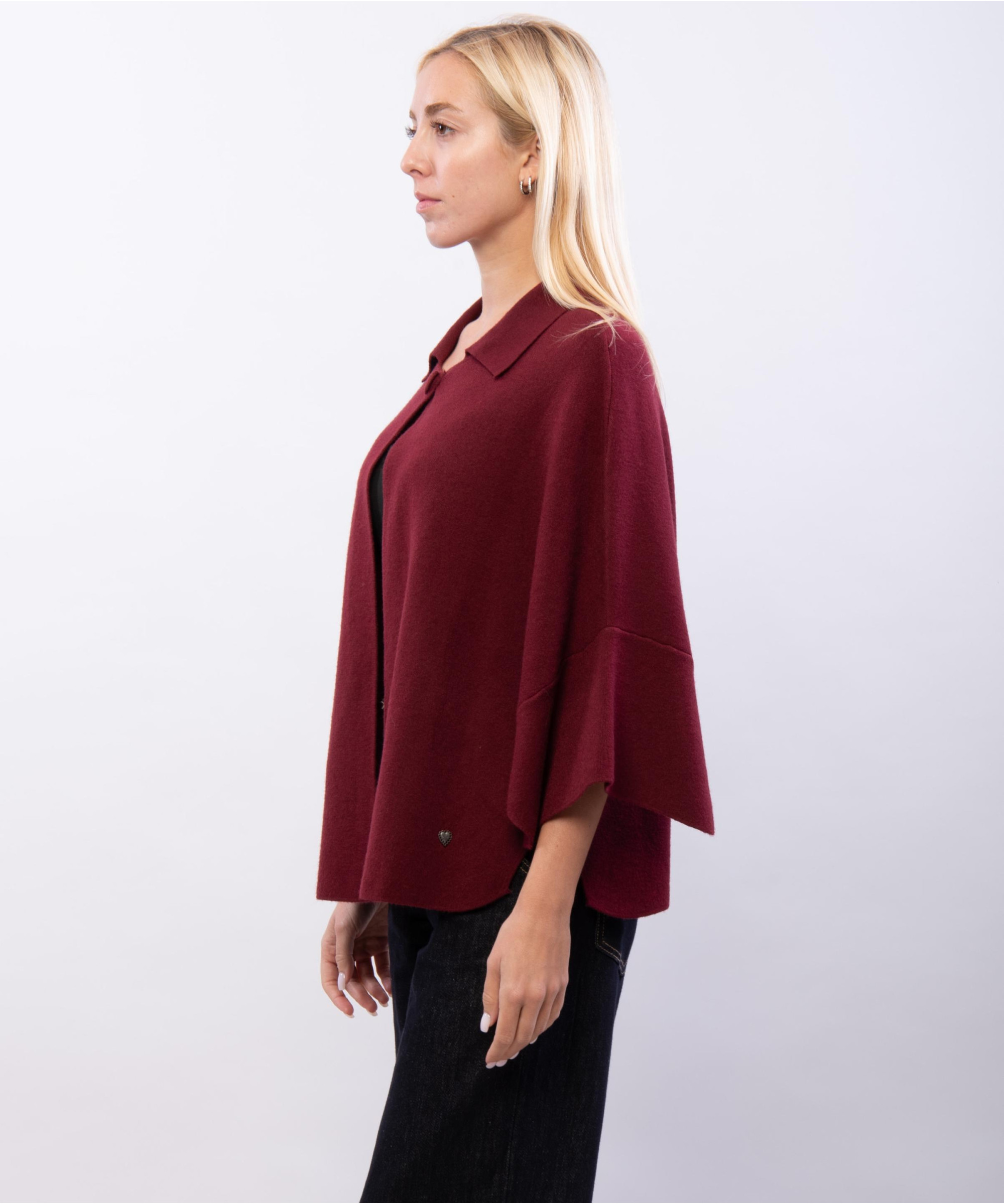 poncho in maglia con colletto