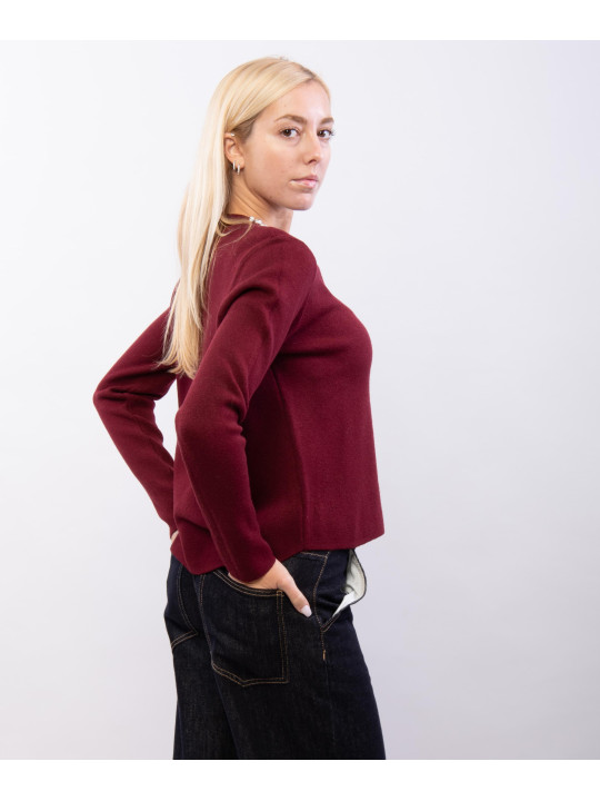 Maglieria con accessorio al collo