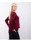 Maglieria con accessorio al collo