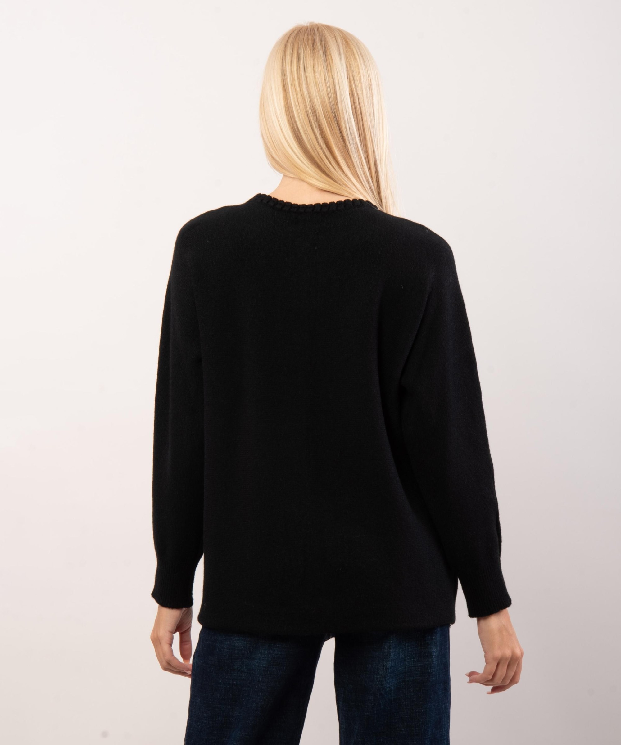maglione con dettagli trecce